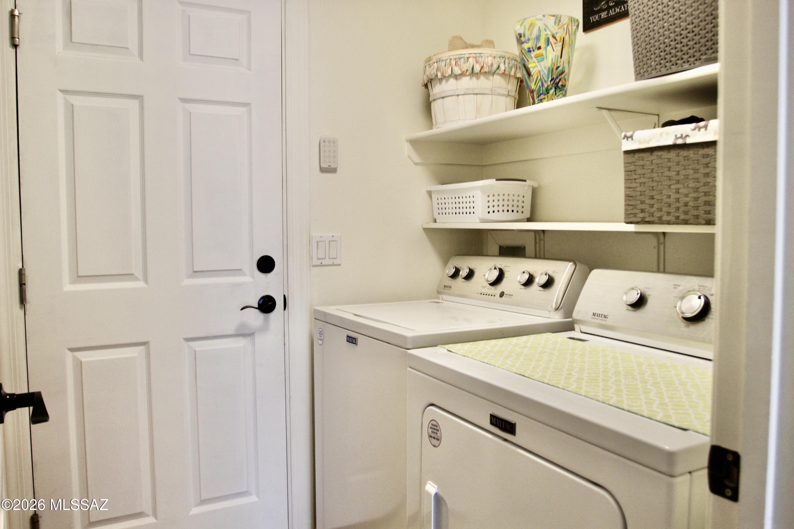 5202 Spring View Drive Tucson, AZ 85749 - Photo 42 of 49 a utility room with dryer and washer