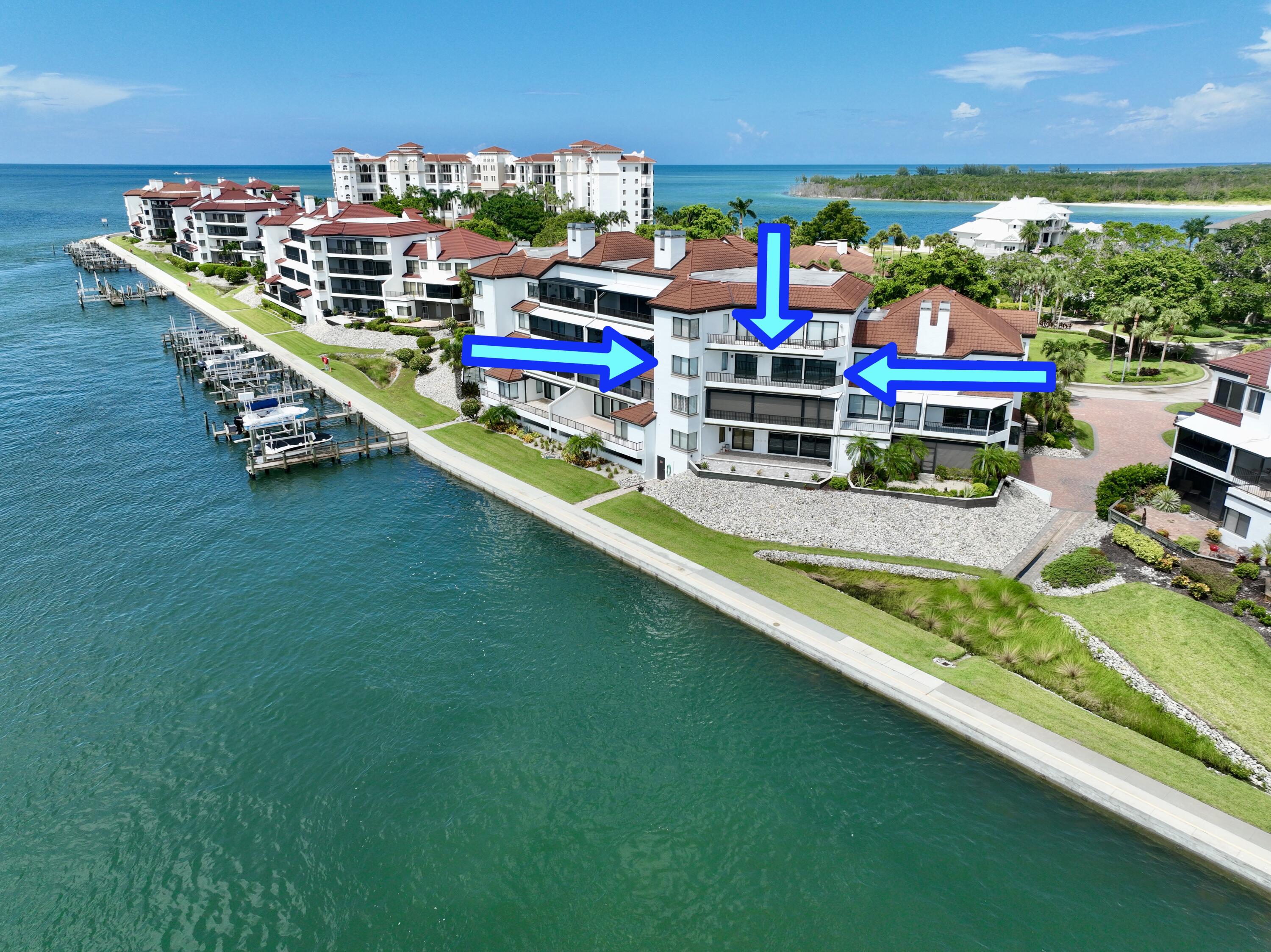 231 La Peninsula Boulevard, Unit 231 Naples, FL 34113 - Photo 27 of 42 swimming pool with outdoor seating and yard