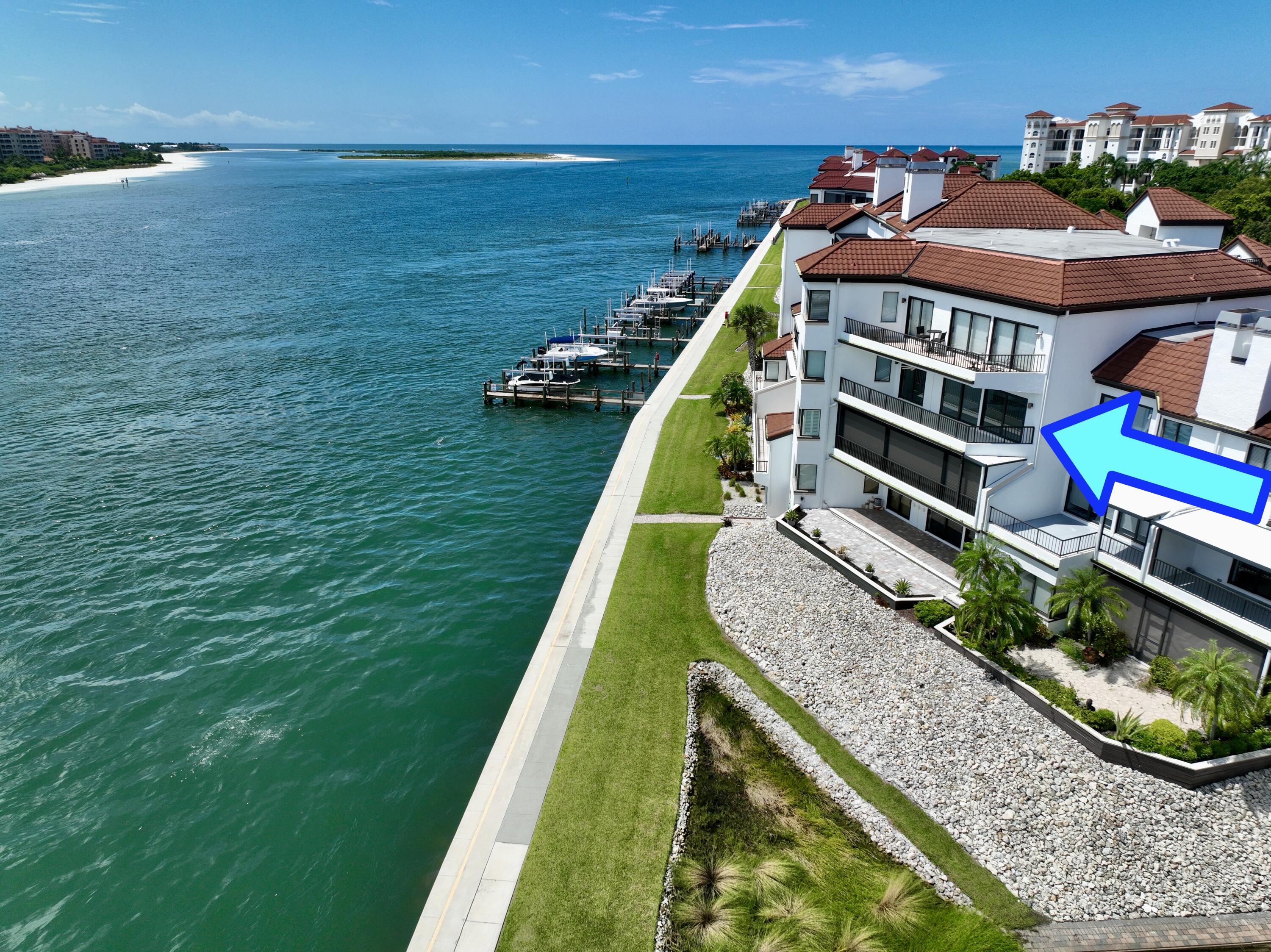 231 La Peninsula Boulevard, Unit 231 Naples, FL 34113 - Photo 31 of 42 a view of outdoor space deck and lake view