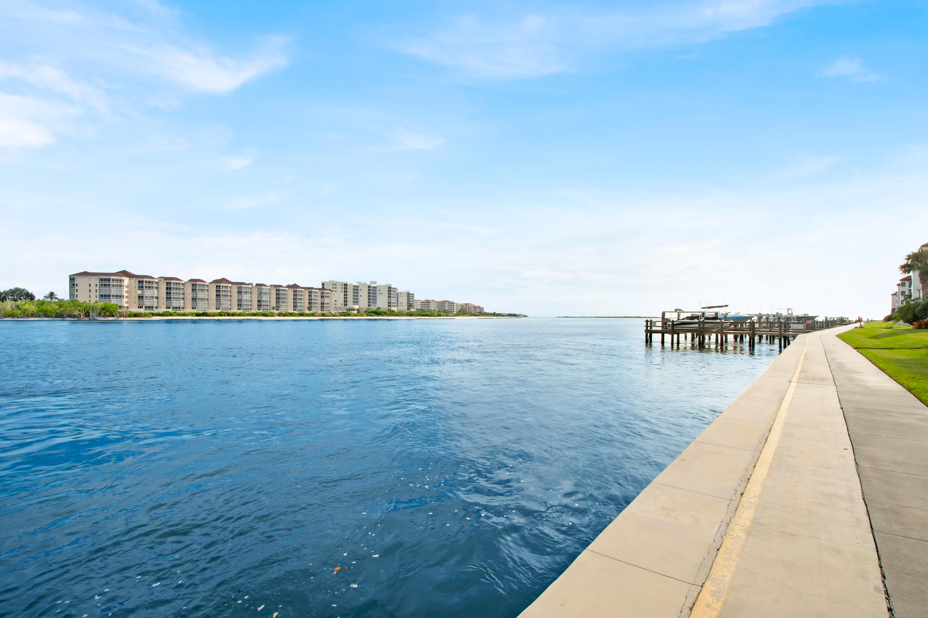231 La Peninsula Boulevard, Unit 231 Naples, FL 34113 - Photo 34 of 42 a view of outdoor space and lake