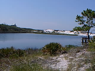 28 Old Beach Road Santa Rosa Beach, FL 32459 - Photo 1 of 1 a view of a lake with a city