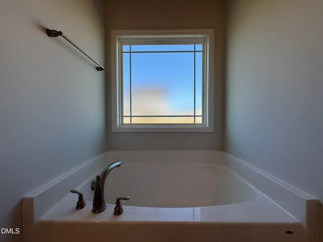 a bathroom with a window