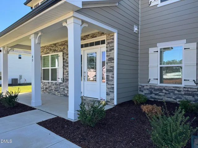 a view of a entryway door front of house