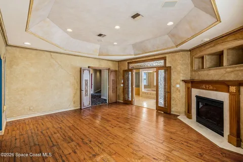 a large living room with a large window