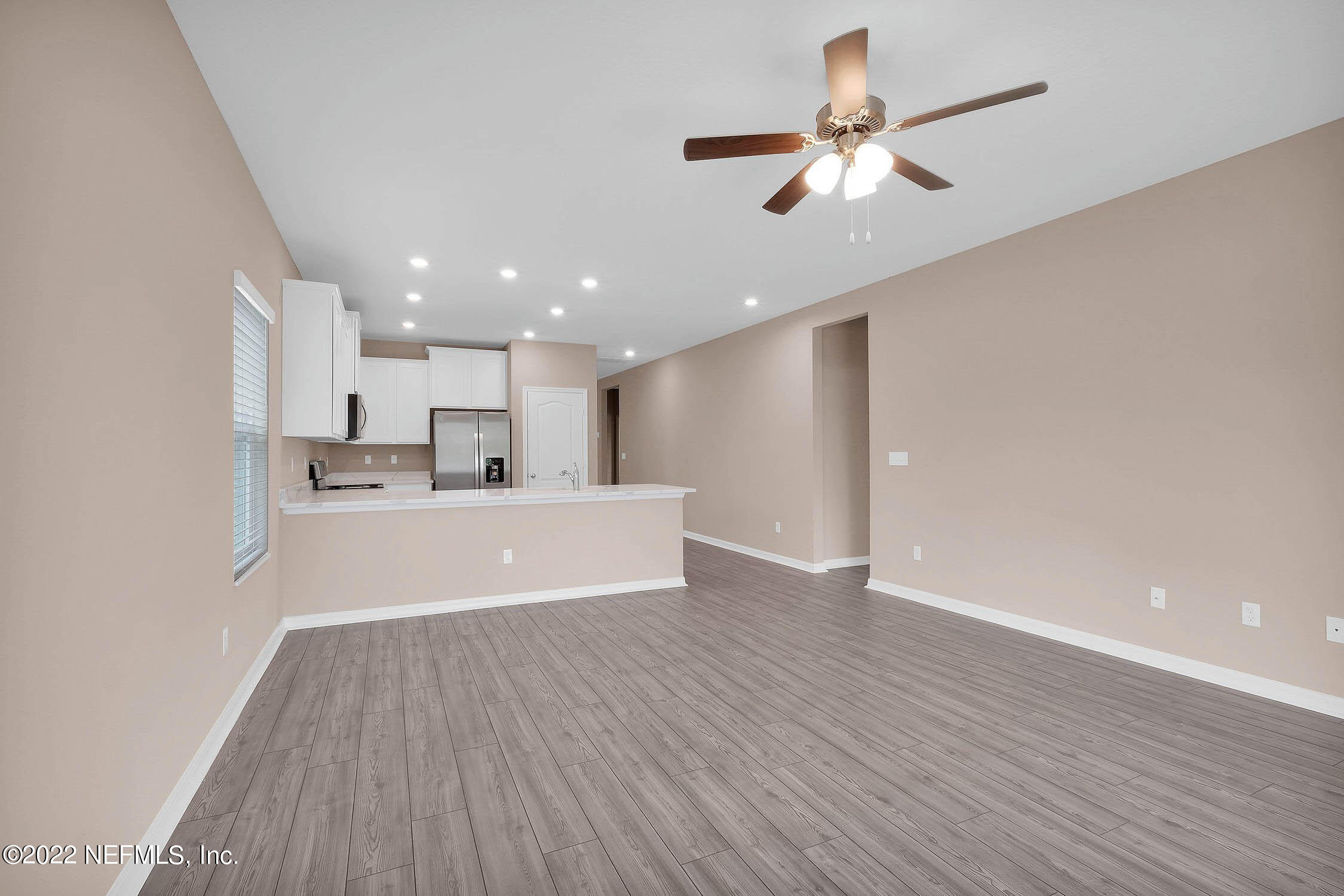 49 Falcon Ridge Road St. Augustine, FL 32084 - Photo 6 of 12 a view of kitchen with refrigerator microwave and stove