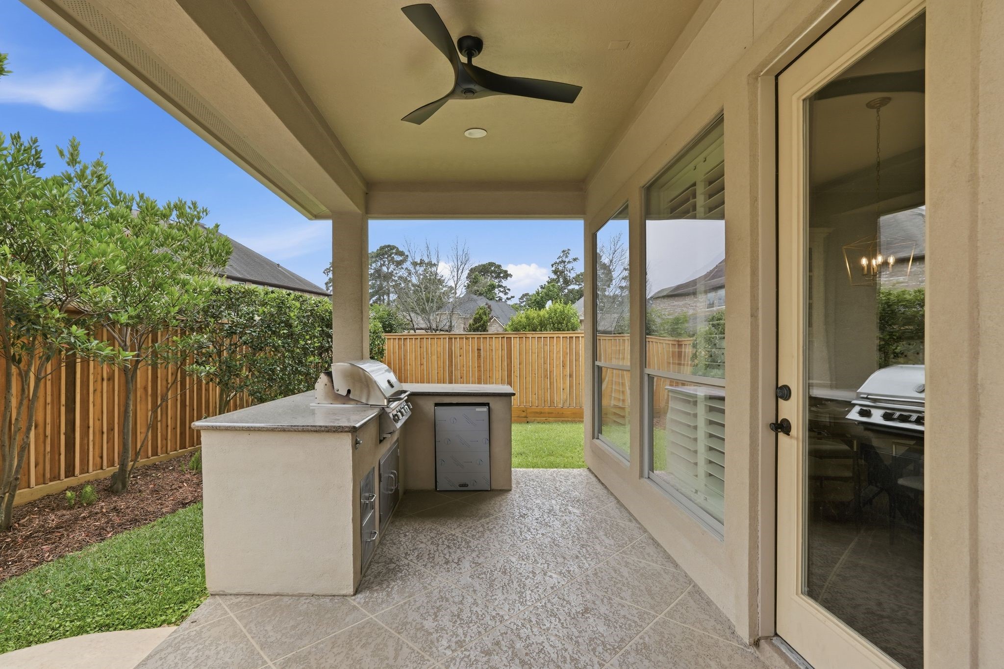 7603 Hogan Bridge Court Spring, TX 77389 - Photo 39 of 50 Designed for outdoor living, this space features a built-in grill and new outdoor fridge.