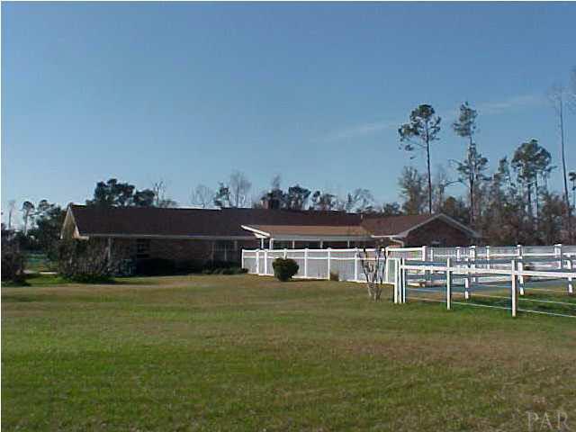 6156 Enfinger Road Pace, FL 32571 - Photo 4 of 20 Rear view of house