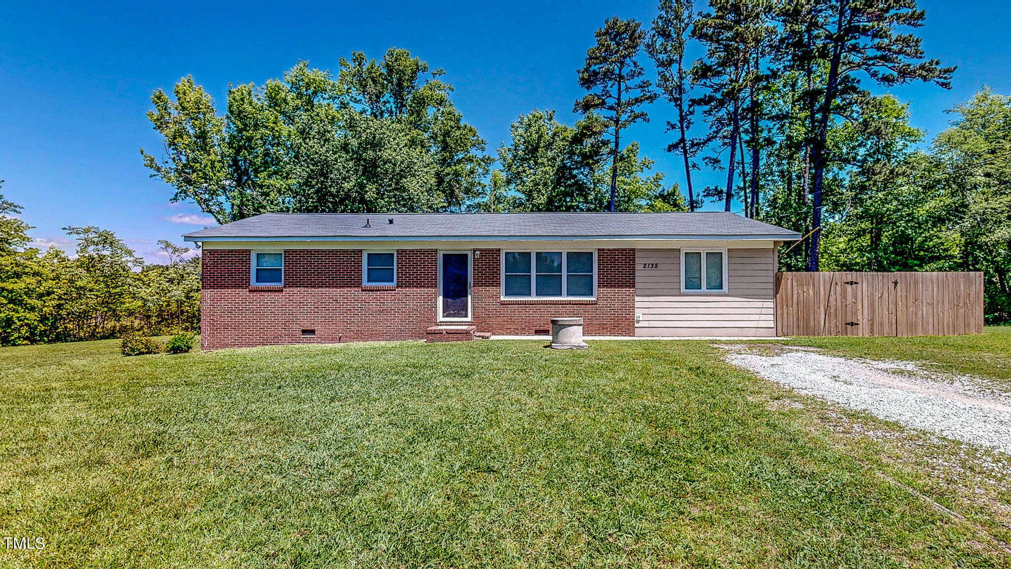 2135 Oxford Road Roxboro, NC 27574 - Photo 19 of 31 a front view of a house with a yard