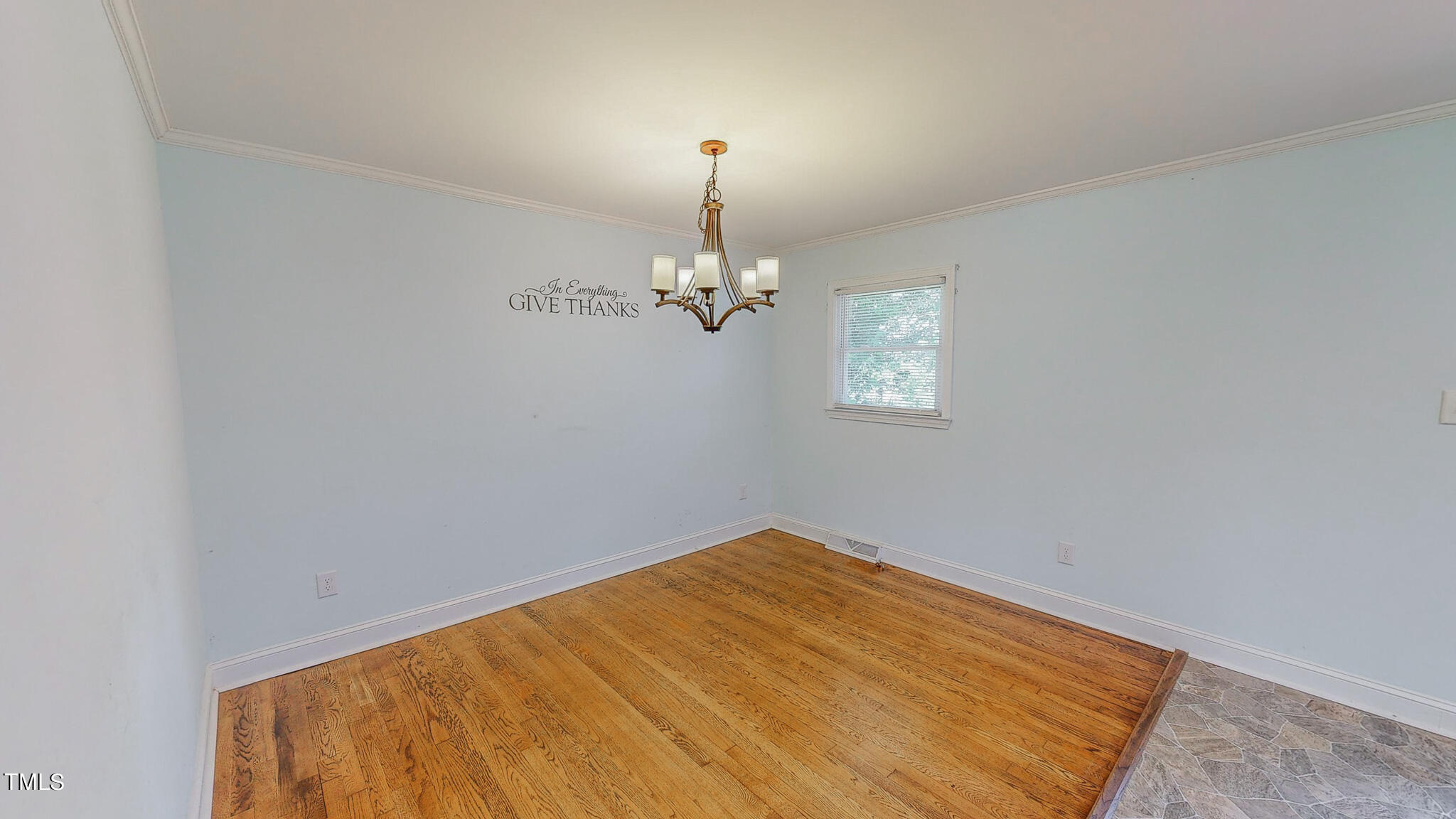 2135 Oxford Road Roxboro, NC 27574 - Photo 23 of 31 a view of empty room with windows