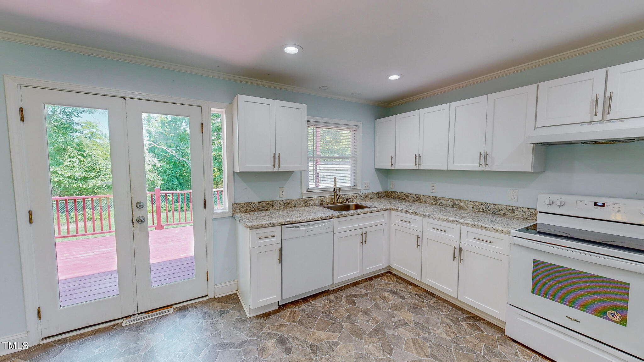 2135 Oxford Road Roxboro, NC 27574 - Photo 3 of 31 a kitchen that has a sink and a stove in it