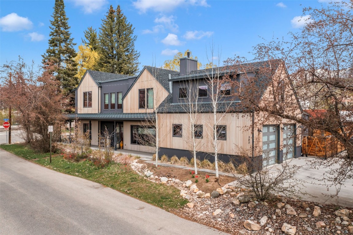 front view of a house with a yard