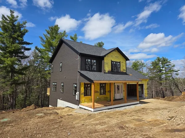 a view of a front of house with a yard