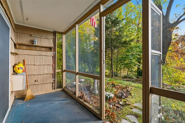 a view of a porch with a door