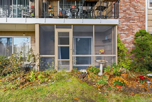 a potted plant sitting in front of a building