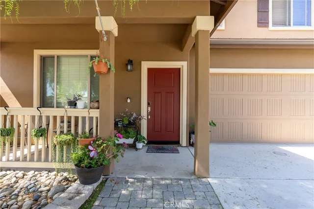 a view of a balcony with a potted plant