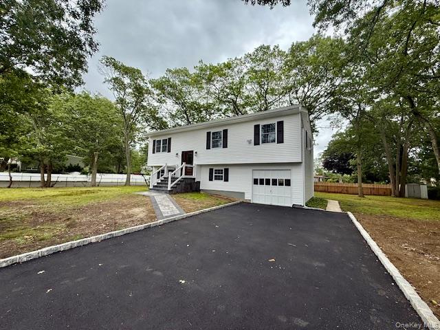 30 7th Street Holbrook, NY 11741 - Photo 1 of 22 a view of a house with a yard