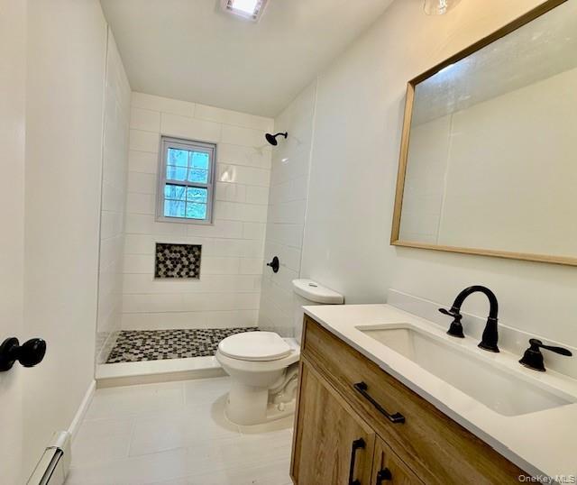 30 7th Street Holbrook, NY 11741 - Photo 17 of 22 a bathroom with a sink a toilet and shower
