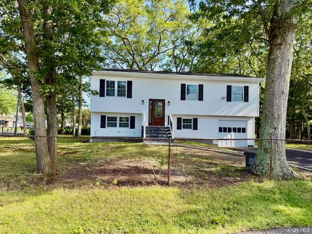 30 7th Street Holbrook, NY 11741 - Photo 21 of 22 a front view of a house with a yard