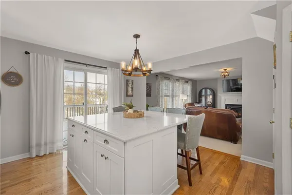 a view of living room and kitchen