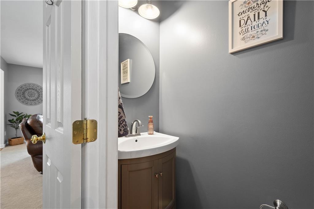 108 Walnut Drive Eighty Four, PA 15330 - Photo 18 of 47 a bathroom with a sink and mirror
