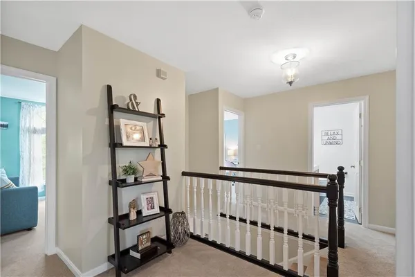 a view of a hallway with workspace