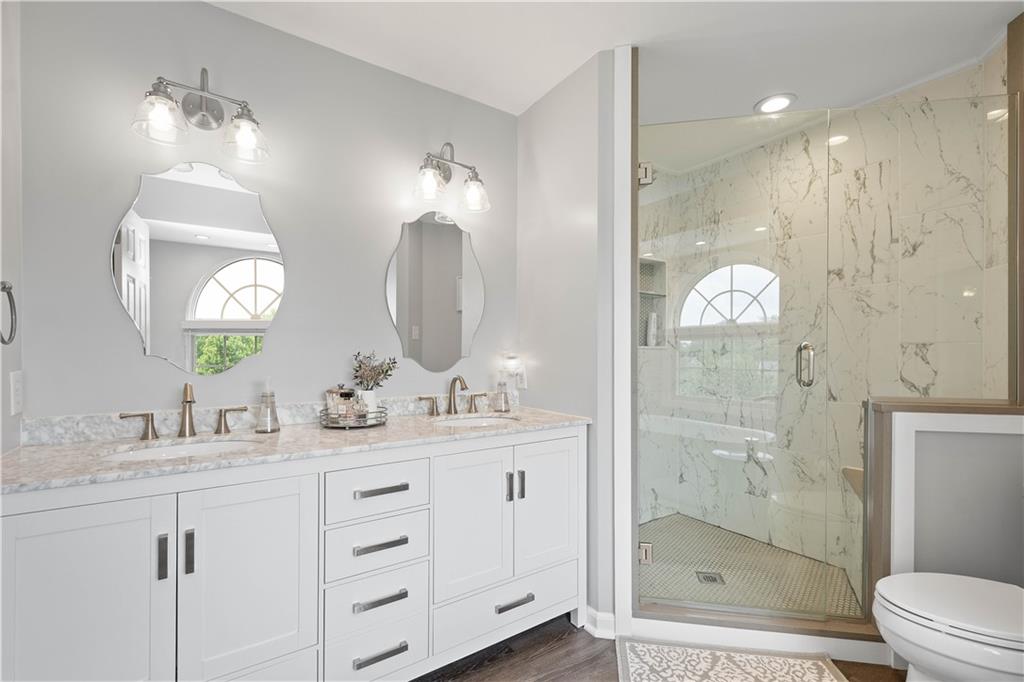 108 Walnut Drive Eighty Four, PA 15330 - Photo 22 of 47 a bathroom with a double vanity sink mirror and shower