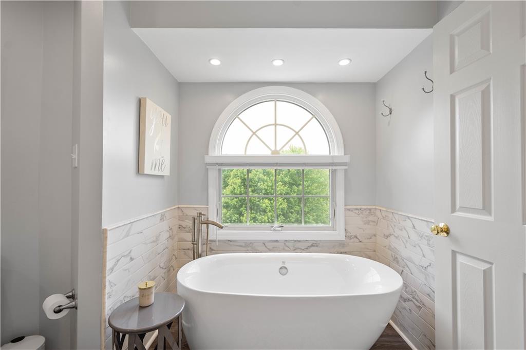 108 Walnut Drive Eighty Four, PA 15330 - Photo 24 of 47 a bath tub sitting next to a window