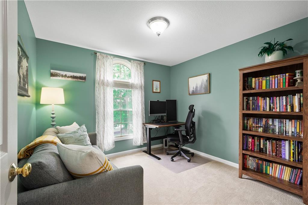 108 Walnut Drive Eighty Four, PA 15330 - Photo 30 of 47 a living room with furniture and a book shelf