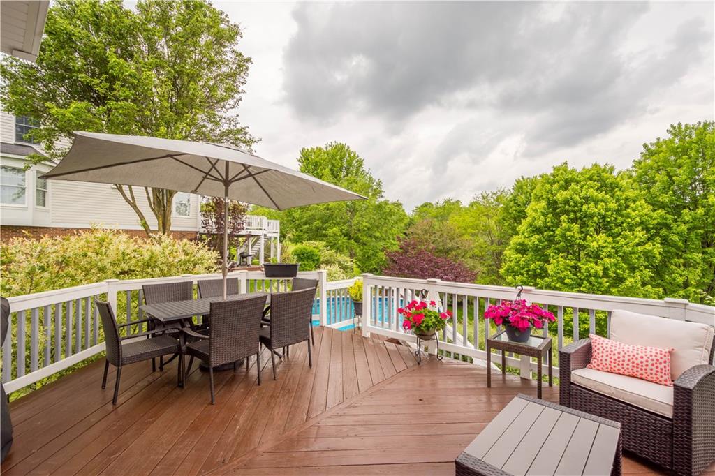 108 Walnut Drive Eighty Four, PA 15330 - Photo 44 of 47 an outdoor sitting space with wooden floor and barbeque oven