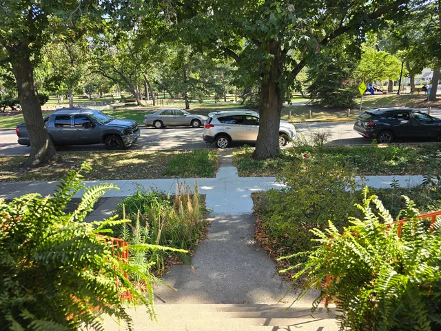 a backyard of a house with lots of green space