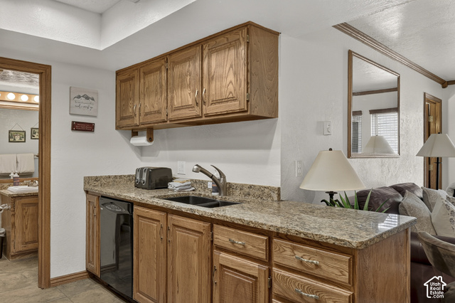150 Ridgeview Street Brian Head, UT 84719 - Photo 10 of 43 Kitchenette featuring wood cabinetry, granite-look countertops, and an undermount sink