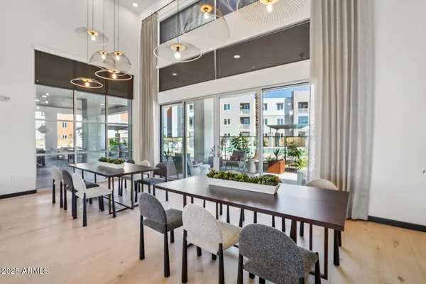 a view of a dining room with furniture window and outside view