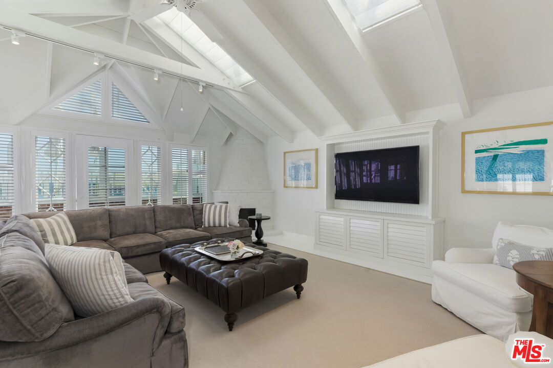 23430 Malibu Colony Road, Unit 95 Malibu, CA 90265 - Photo 14 of 35 a living room with furniture and a couch
