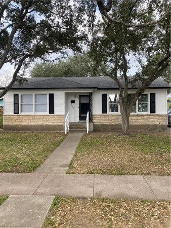 a front view of house with yard