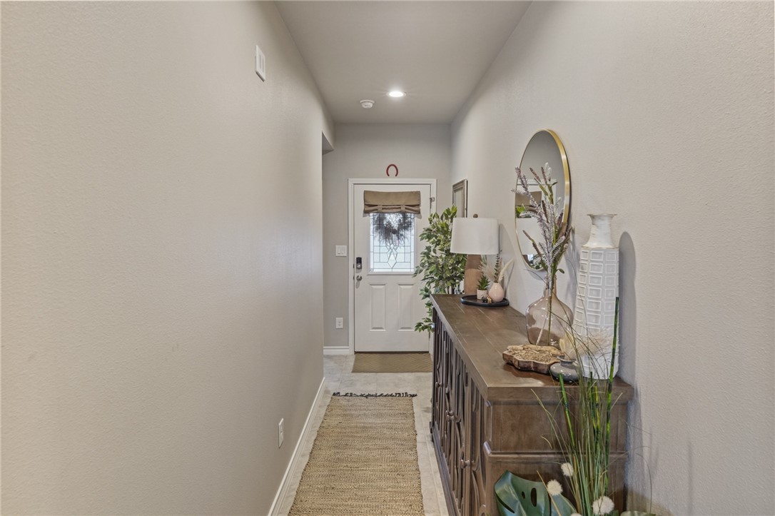 103 Donegal Street Sinton, TX 78387 - Photo 3 of 29 a view of a hallway with workspace