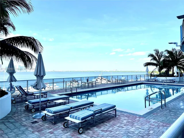 a view of outdoor space with swimming pool