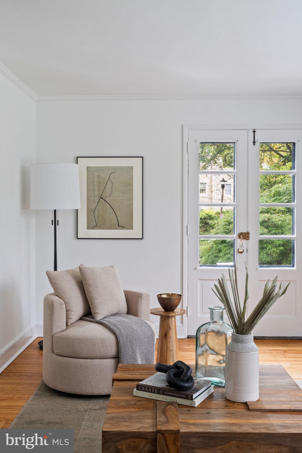 3937 Netherfield Road Philadelphia, PA 19129 - Photo 21 of 84 a living room with furniture and a large window