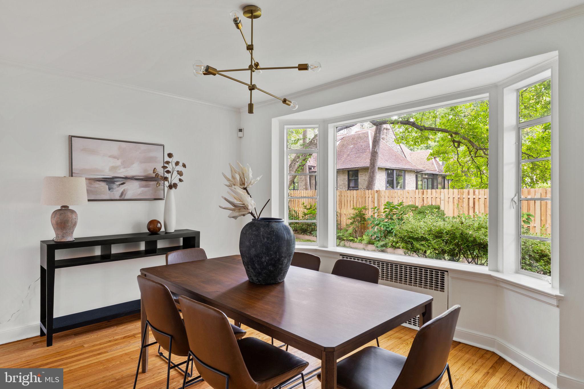 3937 Netherfield Road Philadelphia, PA 19129 - Photo 28 of 84 a view of a dining room with furniture window and wooden floor