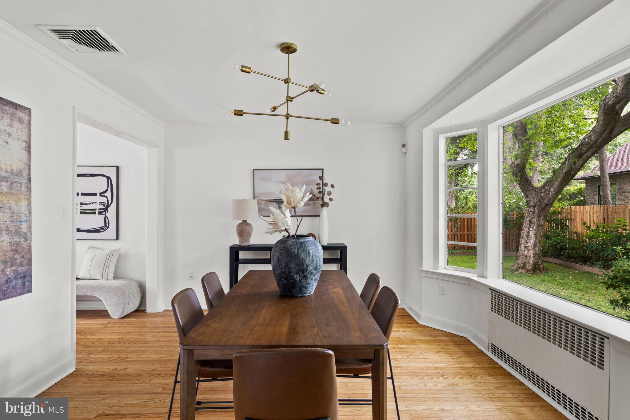 3937 Netherfield Road Philadelphia, PA 19129 - Photo 29 of 84 a view of a dining room with furniture window and wooden floor