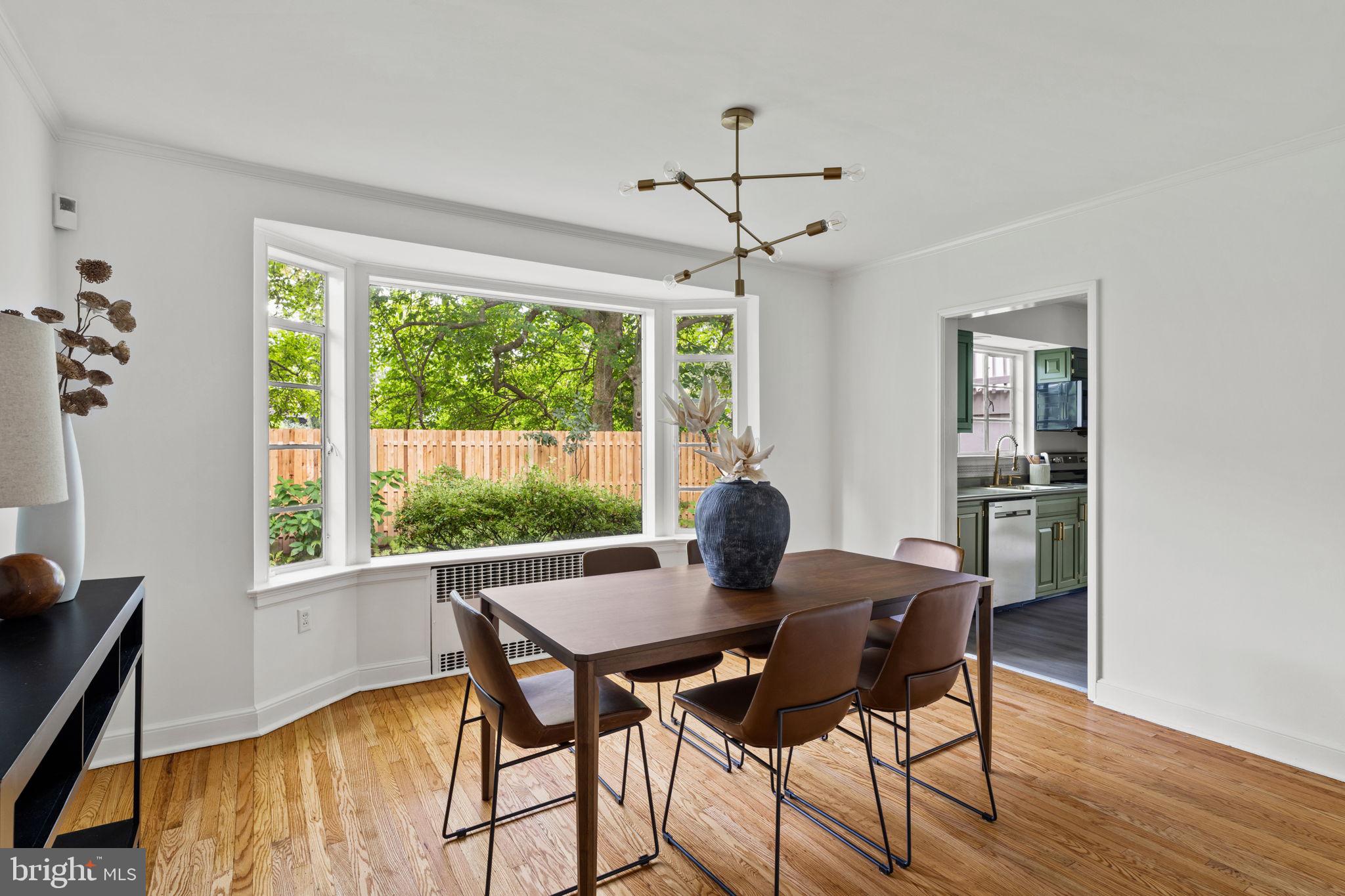 3937 Netherfield Road Philadelphia, PA 19129 - Photo 30 of 84 a view of a dining room with furniture window and wooden floor