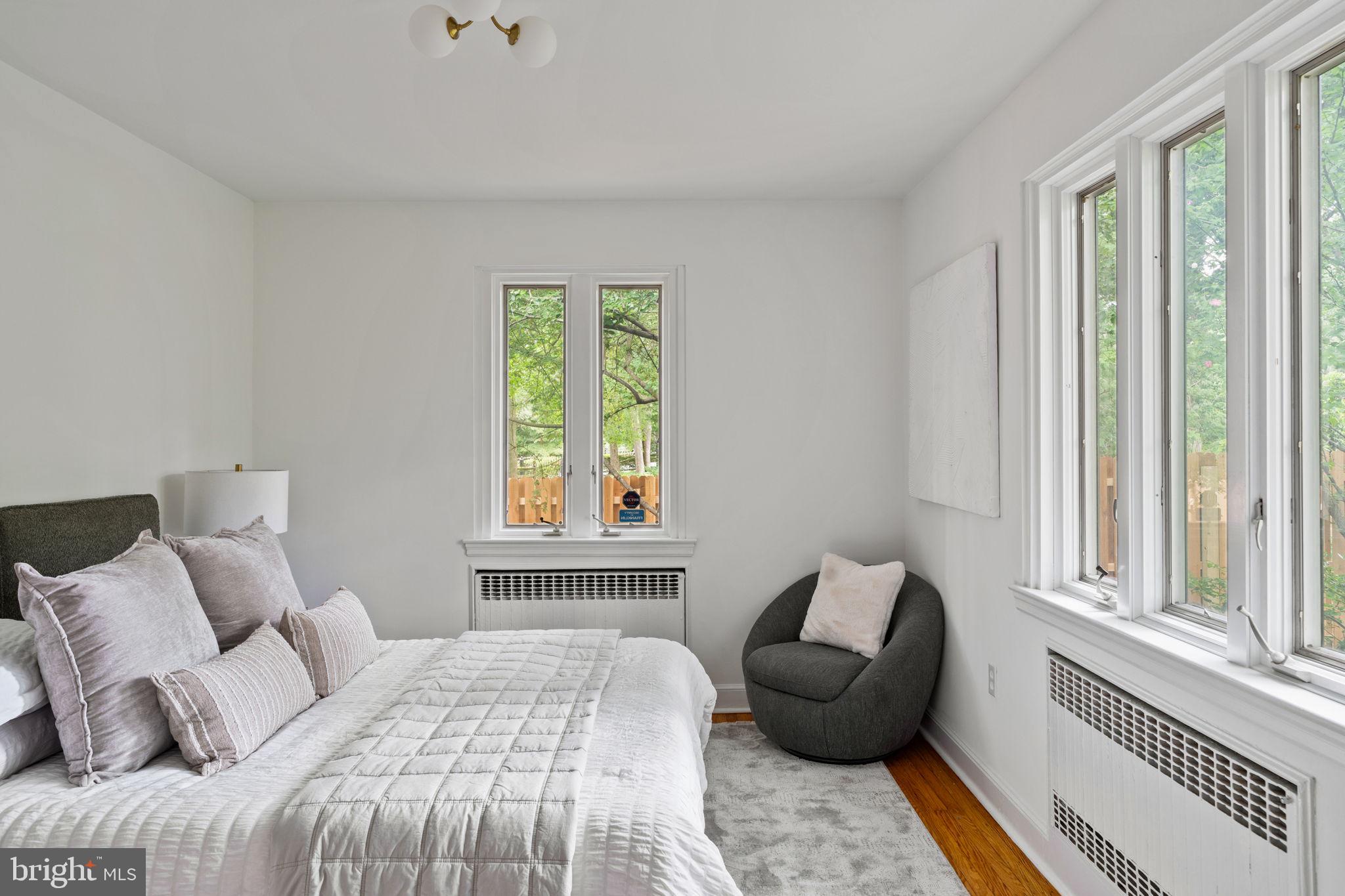 3937 Netherfield Road Philadelphia, PA 19129 - Photo 43 of 84 a bedroom with a bed and a couch