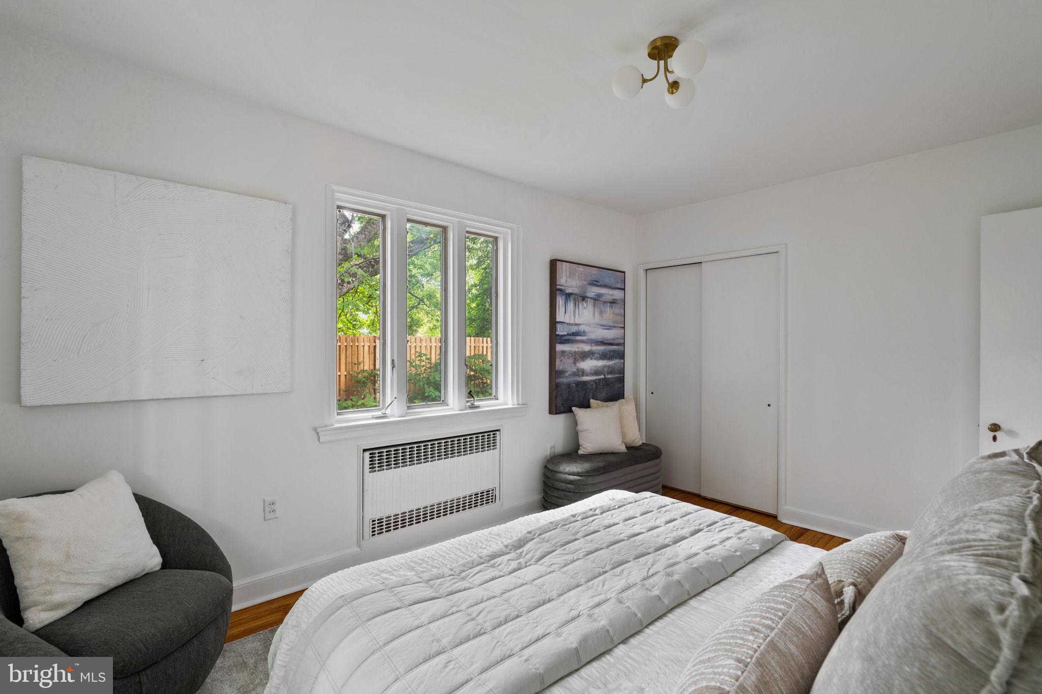 3937 Netherfield Road Philadelphia, PA 19129 - Photo 44 of 84 a bedroom with a bed and a window