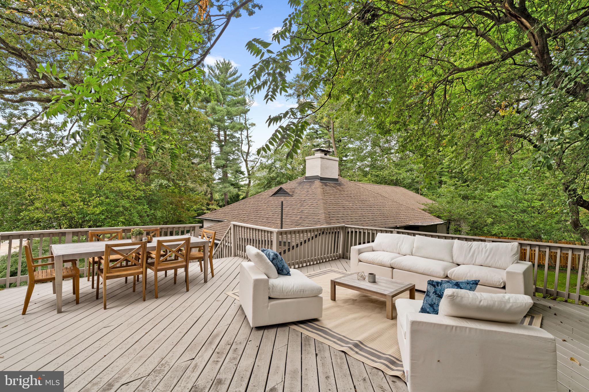 3937 Netherfield Road Philadelphia, PA 19129 - Photo 72 of 84 an outdoor sitting area with furniture and wooden floor