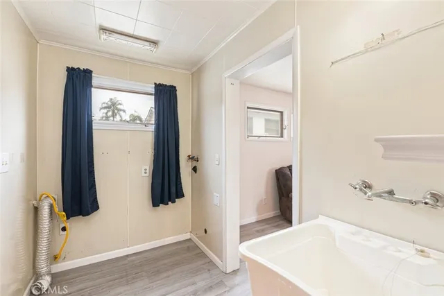 a bathroom with a tub and shower