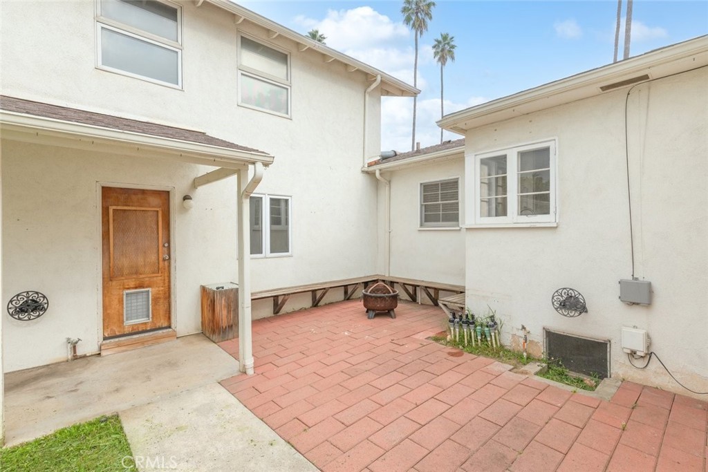 5663 Osburn Place Riverside, CA 92506 - Photo 27 of 38 a bedroom with a bed and a cabinets
