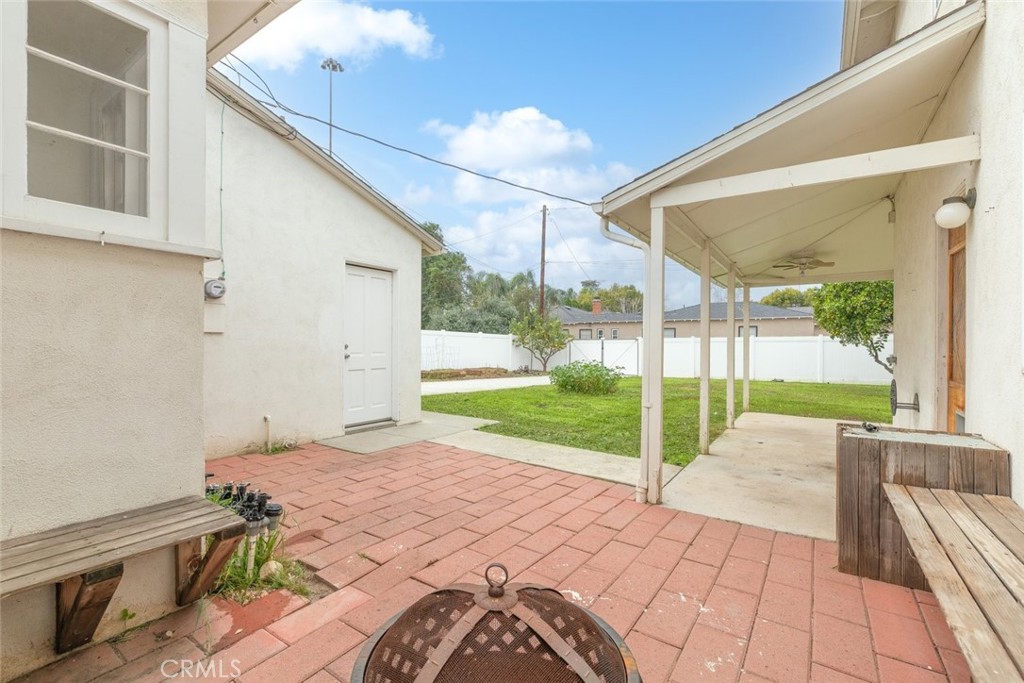 5663 Osburn Place Riverside, CA 92506 - Photo 28 of 38 a view of a porch with wooden floor and fence