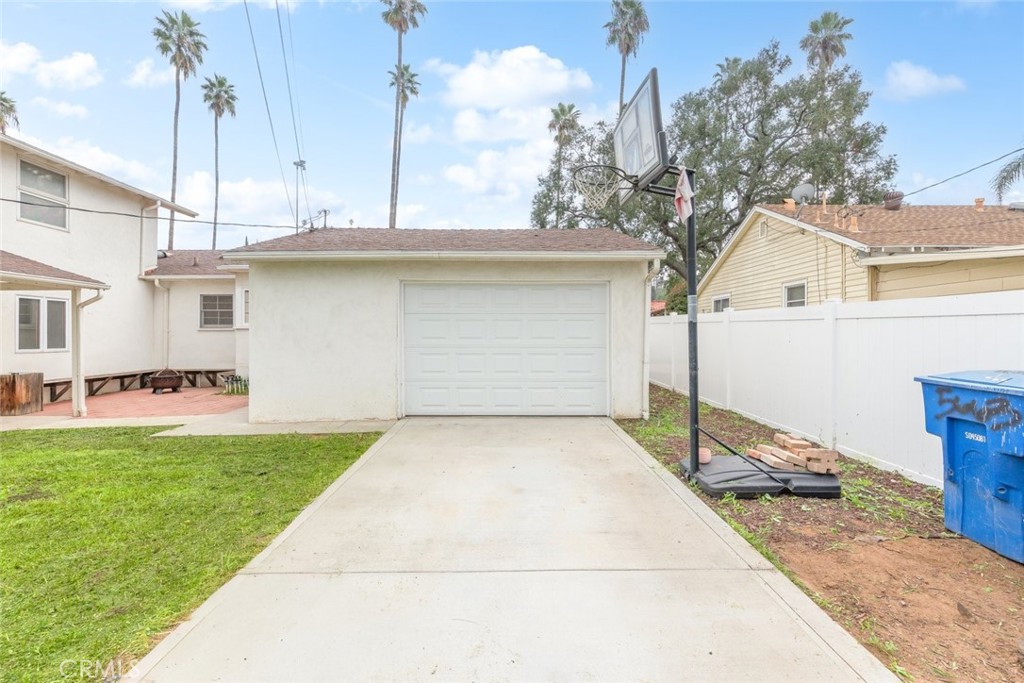 5663 Osburn Place Riverside, CA 92506 - Photo 29 of 38 a front view of a house with garden