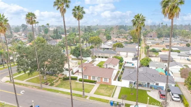 a view of a swimming pool with outdoor seating