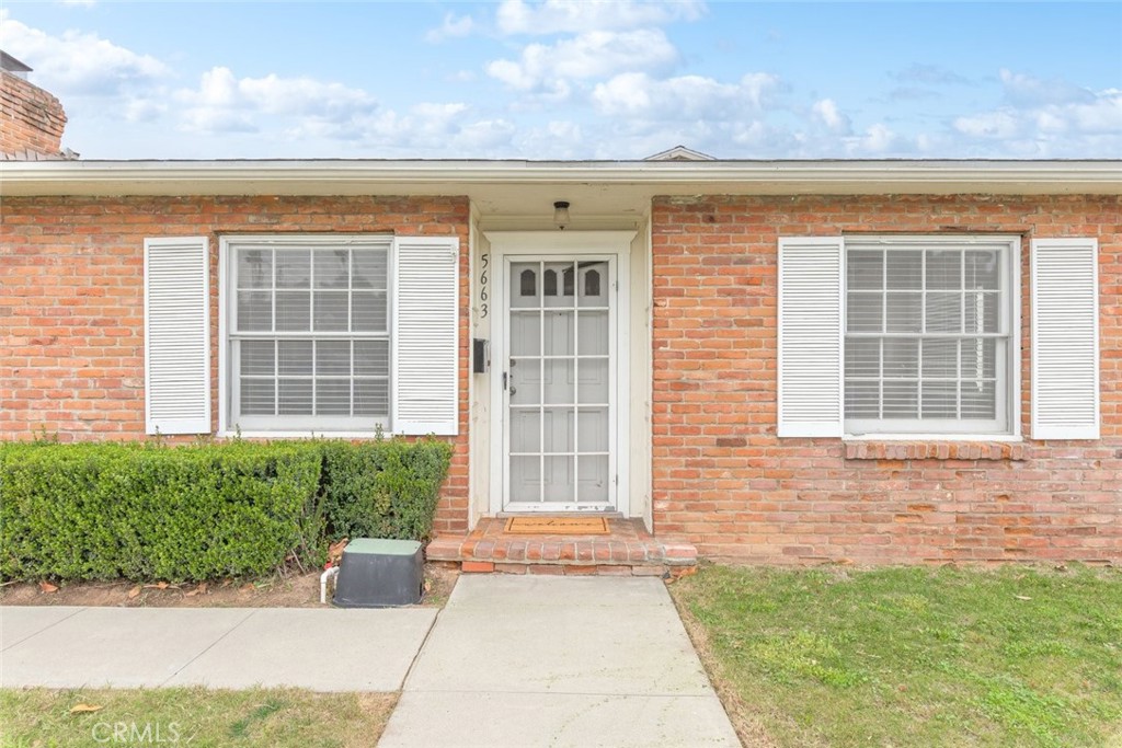 5663 Osburn Place Riverside, CA 92506 - Photo 5 of 38 a front view of a house with a yard