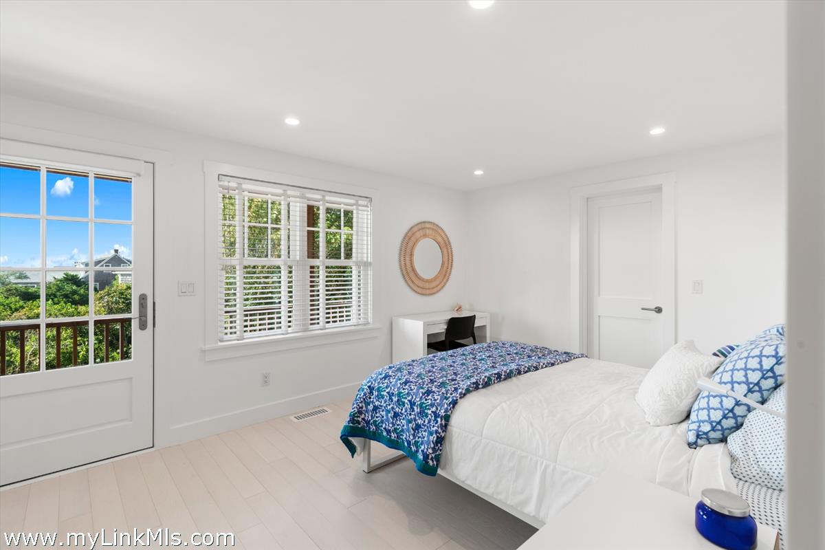 3 Tautemo Way Nantucket, MA 02554 - Photo 39 of 57 a bedroom with a bed and a window